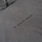 "es neesmu reperis." Washed Black Hoodie